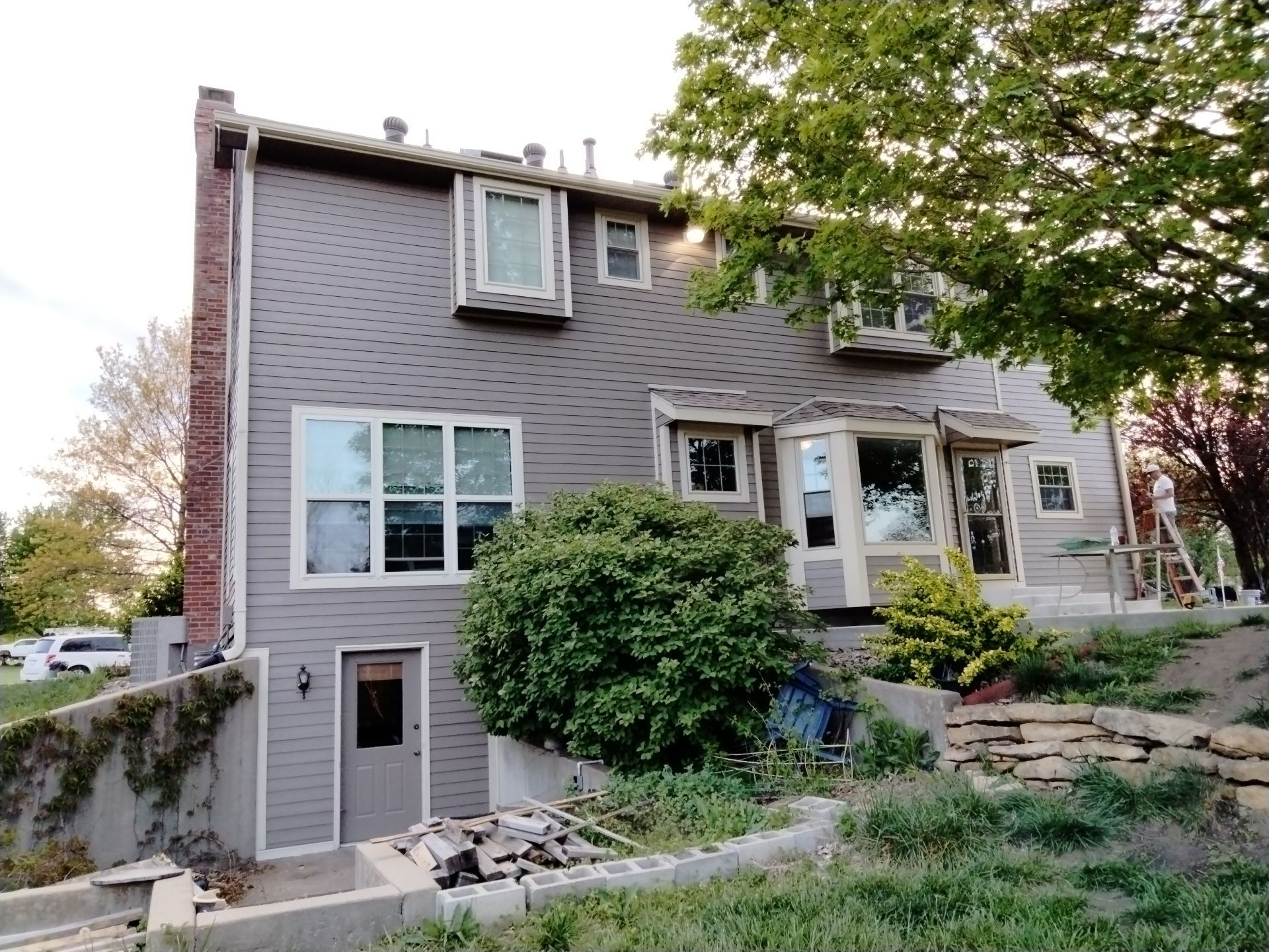 Exterior of a house in Topeka, KS, after exterior painting revitalization.